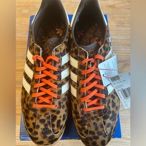 Adidas Women's 8.5 Animal Print Sneakers with Orange Laces.